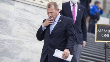 GOP Congressman smoking a cigar