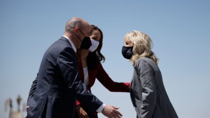 Spencer Cox and his wife greet Jill Biden