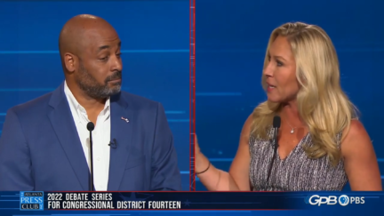 Marcus Flowers (left) and Marjorie Taylor Greene (right) at a debate